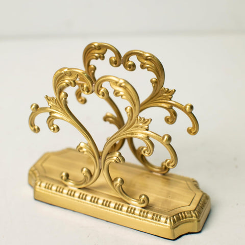YACSNBF porta-servilletas dorado-bronce, resistente y estable al retirar servilletas.