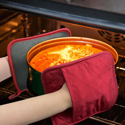 Guantes YEKOO resisten calor hasta 392°F para manejo cómodo de utensilios.
