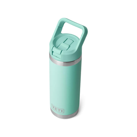 YETI Rambler 18 oz, uso al aire libre, ideal para senderismo.