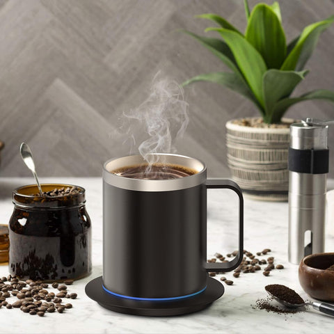 Taza YIMUBREEZ mantiene café a 55°C con tapa.