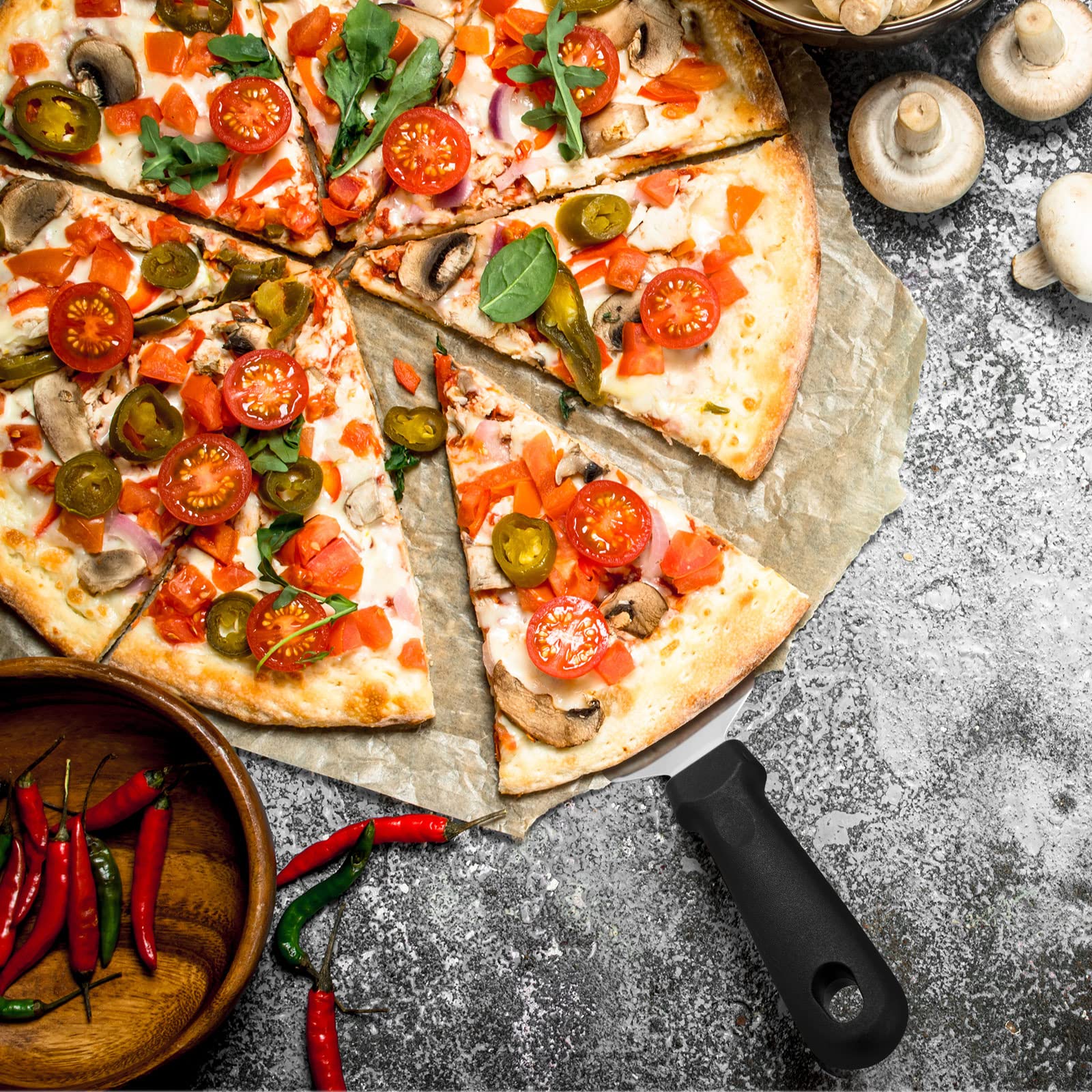 Uso versátil de Yoande: sirve pizzas y pasteles con facilidad