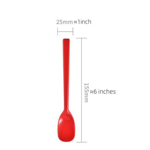 Cucharón de silicona Yoku Made para batidos y mezclas.