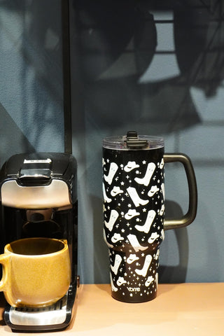 Tapa abatible con pajilla de YOME para beber cómodo en movimiento.