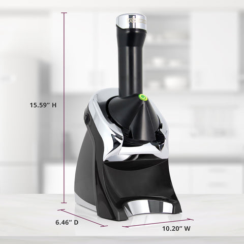Yonanas al lado de plátanos congelados para medir porciones y escala