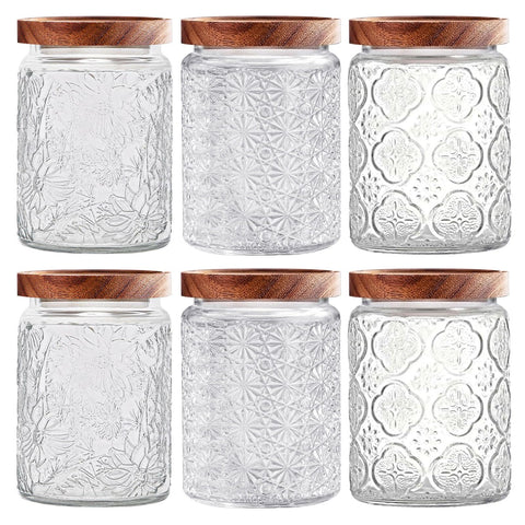 Yoqelt frascos de vidrio vintage con tapas de madera, ideales para conservar galletas.