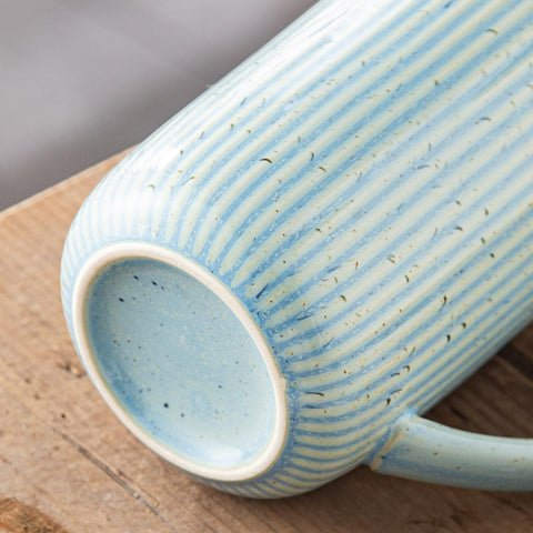 Capacidad de 470 ml para té o café en Yundu.