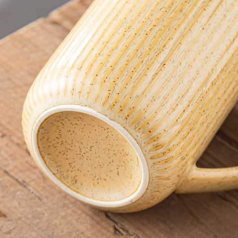 Uso diario cómodo con taza Yundu de 470 ml.