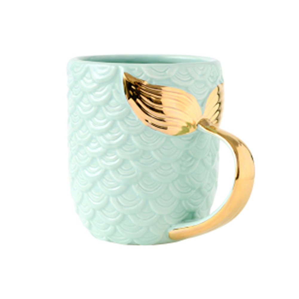 ZaH Mermaid: taza azul con mango dorado y cola de sirena, perfecta para café diario