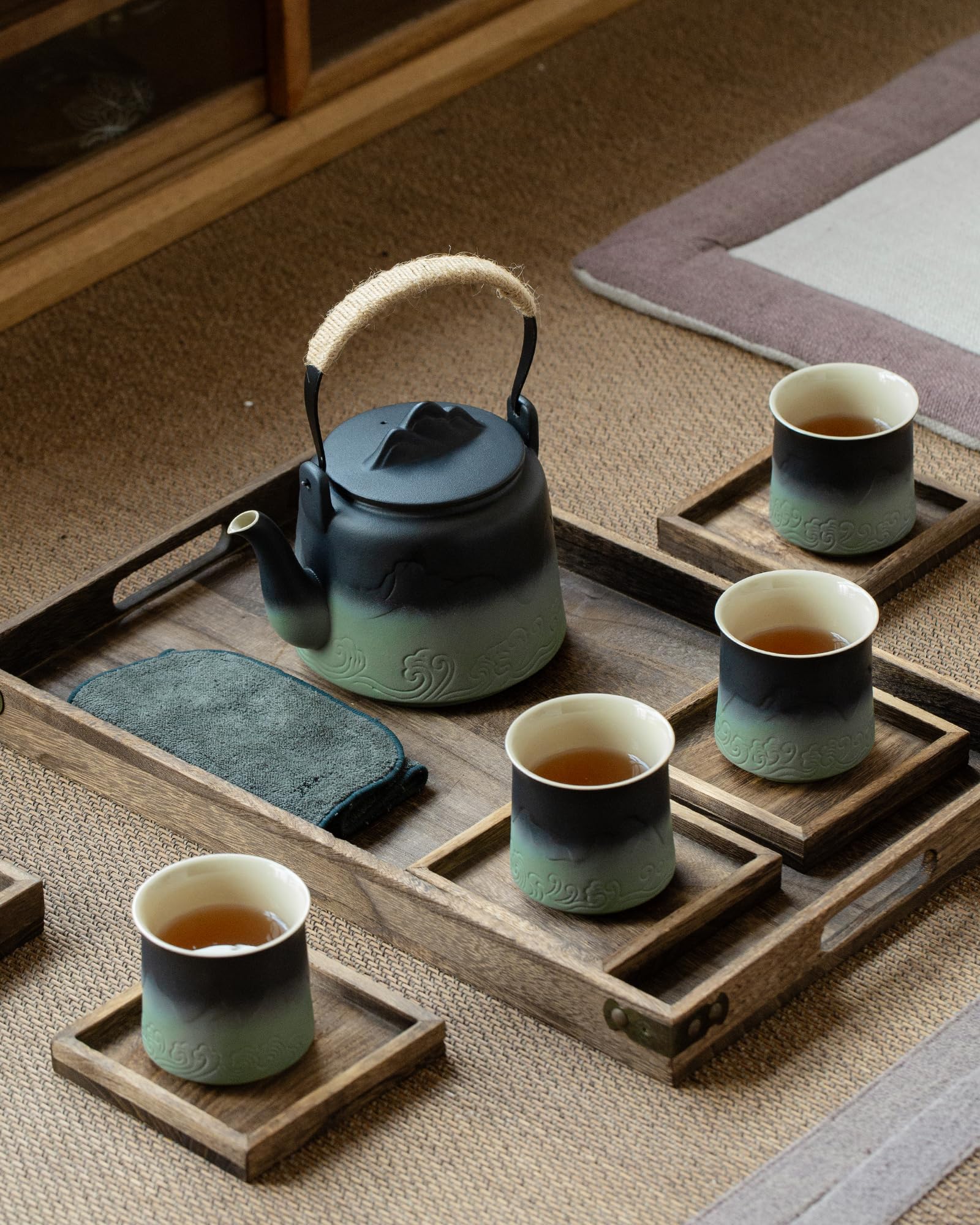ZENS juego de té japonés con cuatro tazas cerámicas para momentos compartidos.