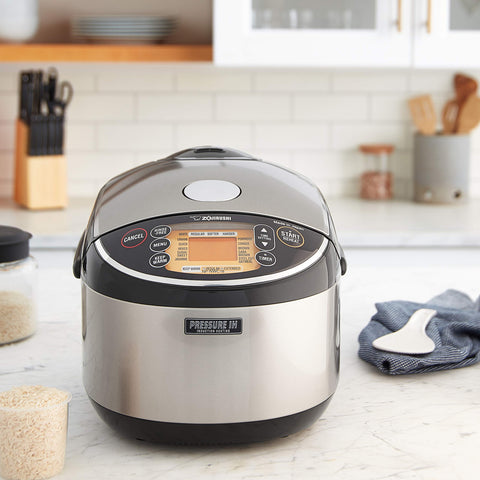 Zojirushi NP-NWC18 interior acero inoxidable desmontable, limpieza fácil y durabilidad.