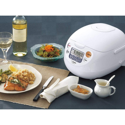 Interior de la Zojirushi NS-WAC10-WD muestra distribución de calor para cocción pareja.