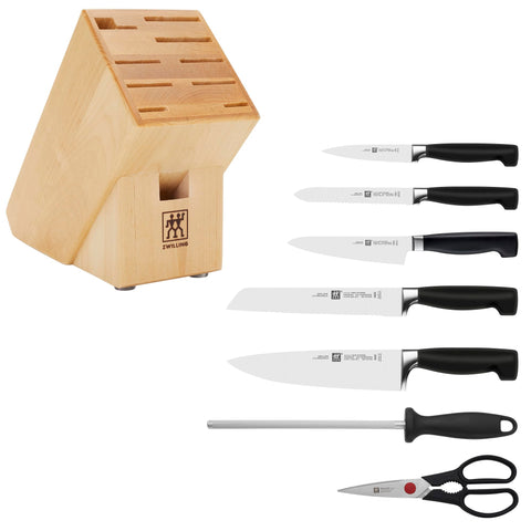 Cuchillo dentado ZWILLING Four Star Anniversary 5 pulgadas, ideal para pan crujiente.